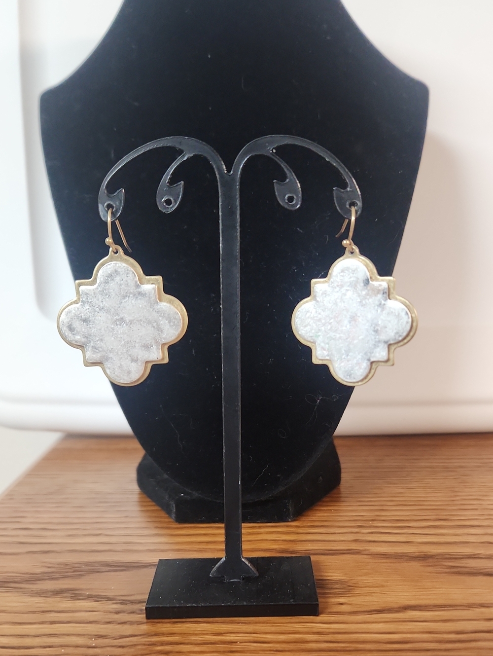 Silver-toned and gold-rimmed quatrefoil drop earrings-Heavy